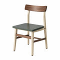 Silla de madera y metal con asiento verde
